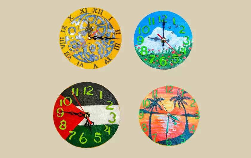 4 designs of clocks from PaperReverse