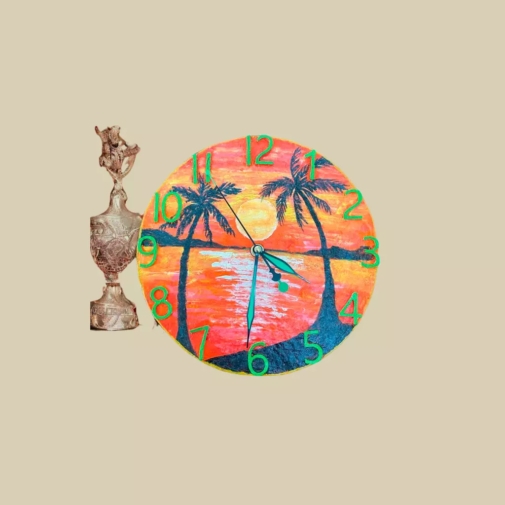 art clock with sunrise, beach and palm trees